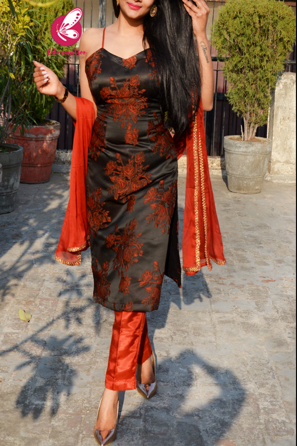 Rust Silk Floral Motifs Embroidered Padded Kurti with Rust Shantoon Pants and Rust Chinnon Golden Lace Stole