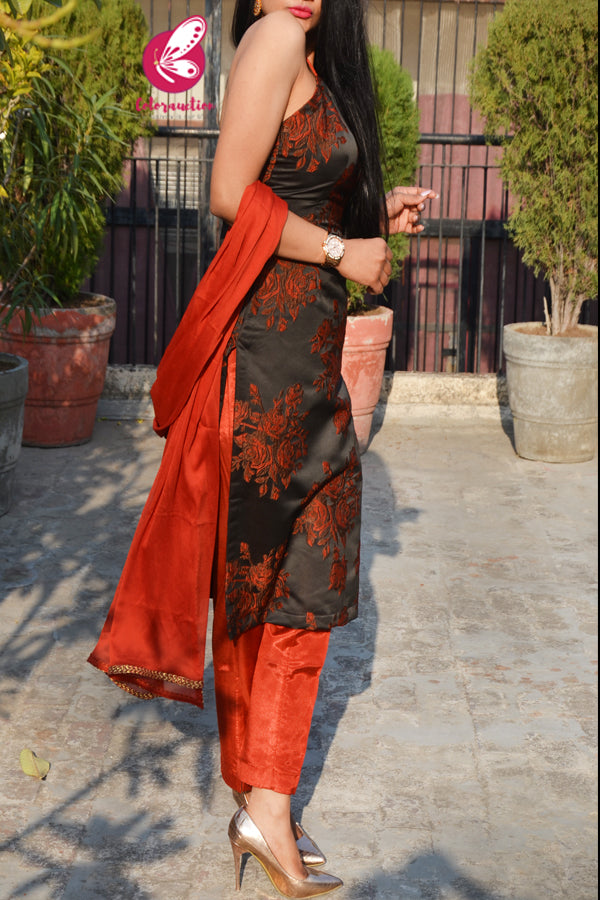 Rust Silk Floral Motifs Embroidered Padded Kurti with Rust Shantoon Pants and Rust Chinnon Golden Lace Stole