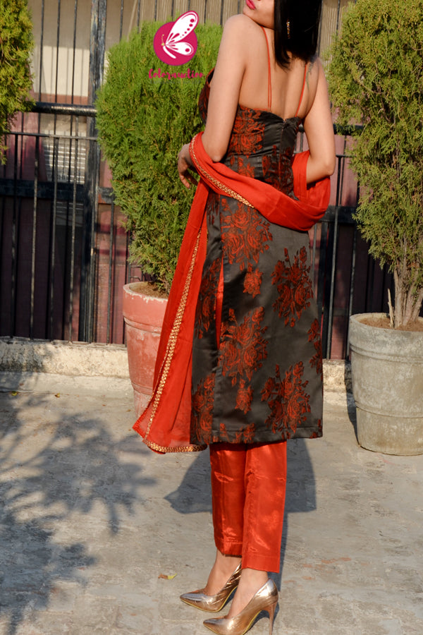 Rust Silk Floral Motifs Embroidered Padded Kurti with Rust Shantoon Pants and Rust Chinnon Golden Lace Stole