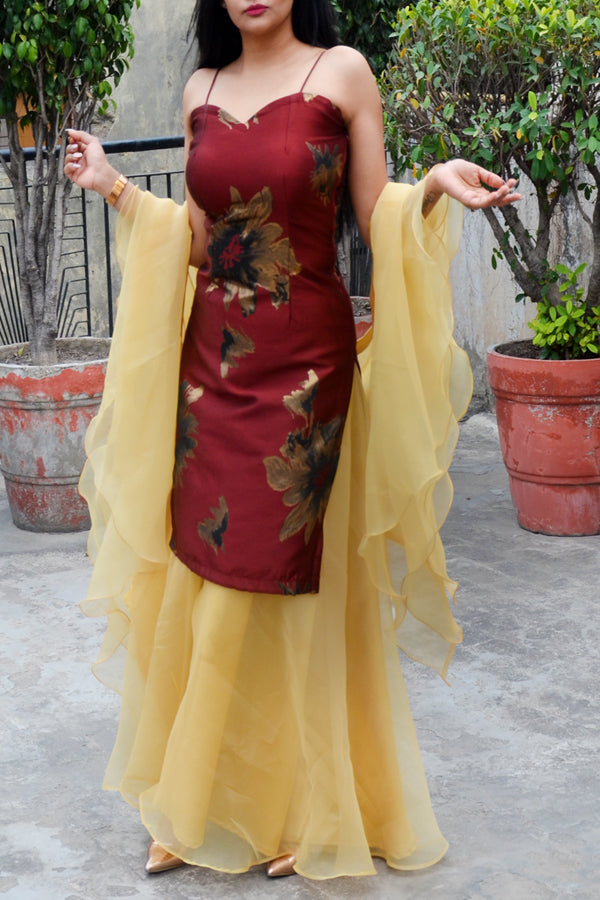 Rust Maroon Brocade Padded Kurta with Golden Organza Sharara and Golden Organza Three-Tier Ruffle Stole