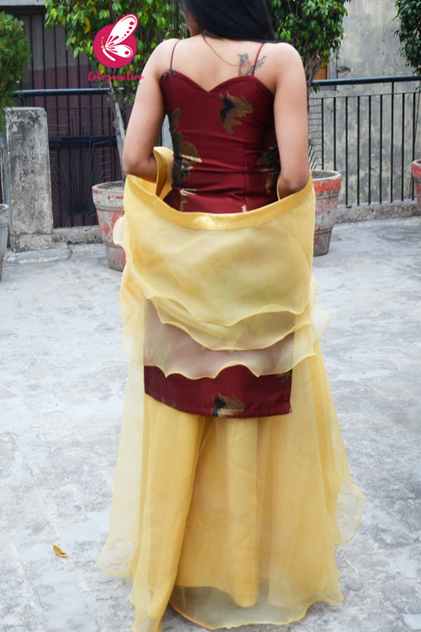 Rust Maroon Brocade Padded Kurta with Golden Organza Sharara and Golden Organza Three-Tier Ruffle Stole