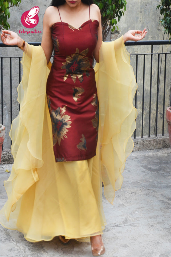 Rust Maroon Brocade Padded Kurta with Golden Organza Sharara and Golden Organza Three-Tier Ruffle Stole